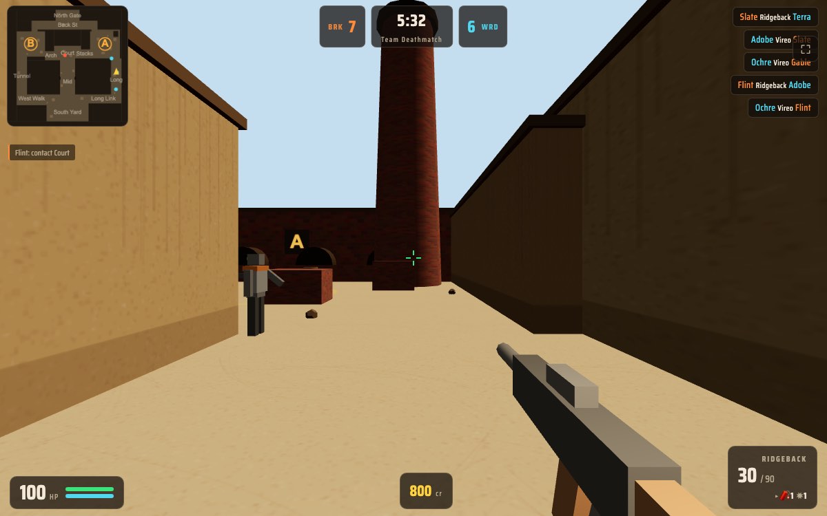 Wirecut gameplay: pushing the Long lane toward Site A under the brick chimney of Kiln, rifle raised, minimap and squad radio live